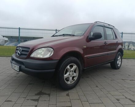 Червоний Мерседес МЛ 320, об'ємом двигуна 3.2 л та пробігом 350 тис. км за 5699 $, фото 1 на Automoto.ua