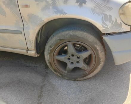 Серый Мерседес МЛ 320, объемом двигателя 3.2 л и пробегом 515 тыс. км за 3950 $, фото 8 на Automoto.ua