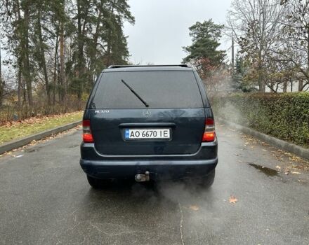 Синій Мерседес МЛ 320, об'ємом двигуна 3.2 л та пробігом 280 тис. км за 5499 $, фото 3 на Automoto.ua