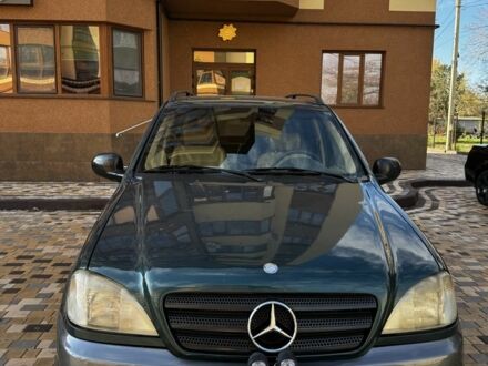 Зеленый Мерседес МЛ 320, объемом двигателя 3.2 л и пробегом 250 тыс. км за 5300 $, фото 1 на Automoto.ua