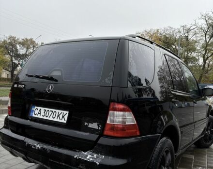 Черный Мерседес МЛ 350, объемом двигателя 3.5 л и пробегом 230 тыс. км за 6700 $, фото 2 на Automoto.ua