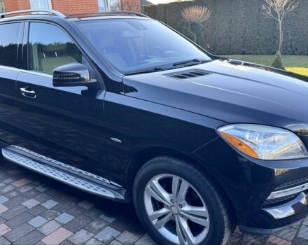 Чорний Мерседес МЛ 350, об'ємом двигуна 3 л та пробігом 184 тис. км за 18900 $, фото 1 на Automoto.ua