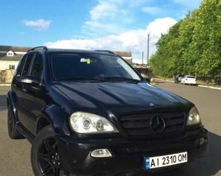 Черный Мерседес МЛ 350, объемом двигателя 3.7 л и пробегом 325 тыс. км за 5555 $, фото 1 на Automoto.ua