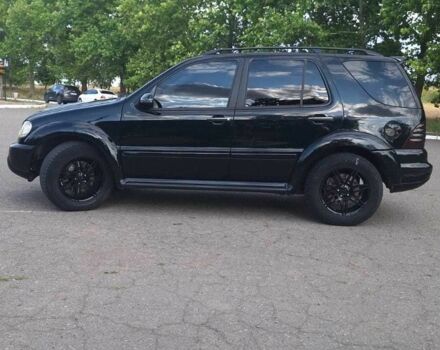 Черный Мерседес МЛ 350, объемом двигателя 3.7 л и пробегом 325 тыс. км за 5555 $, фото 7 на Automoto.ua