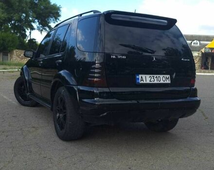 Черный Мерседес МЛ 350, объемом двигателя 3.7 л и пробегом 325 тыс. км за 5555 $, фото 5 на Automoto.ua