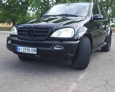Черный Мерседес МЛ 350, объемом двигателя 3.7 л и пробегом 325 тыс. км за 5555 $, фото 4 на Automoto.ua
