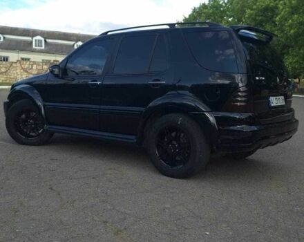 Черный Мерседес МЛ 350, объемом двигателя 3.7 л и пробегом 325 тыс. км за 5555 $, фото 6 на Automoto.ua