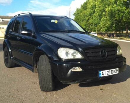 Черный Мерседес МЛ 350, объемом двигателя 3.7 л и пробегом 325 тыс. км за 5555 $, фото 2 на Automoto.ua