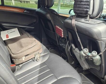 Чорний Мерседес МЛ 350, об'ємом двигуна 3.5 л та пробігом 194 тис. км за 11000 $, фото 16 на Automoto.ua