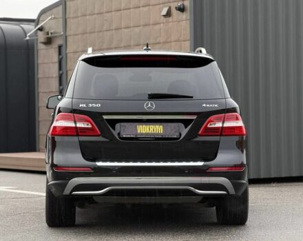 Черный Мерседес МЛ 350, объемом двигателя 3.5 л и пробегом 331 тыс. км за 16950 $, фото 6 на Automoto.ua
