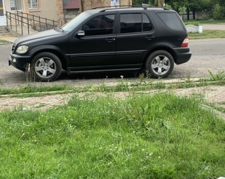 Сірий Мерседес МЛ 350, об'ємом двигуна 3.7 л та пробігом 430 тис. км за 6800 $, фото 1 на Automoto.ua
