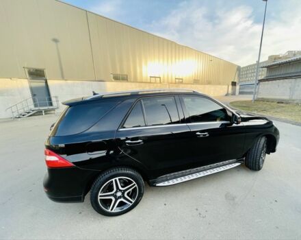 Чорний Мерседес МЛ 400, об'ємом двигуна 3 л та пробігом 157 тис. км за 25300 $, фото 13 на Automoto.ua