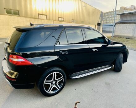 Чорний Мерседес МЛ 400, об'ємом двигуна 3 л та пробігом 157 тис. км за 25300 $, фото 2 на Automoto.ua