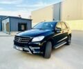 Чорний Мерседес МЛ 400, об'ємом двигуна 3 л та пробігом 157 тис. км за 25300 $, фото 1 на Automoto.ua