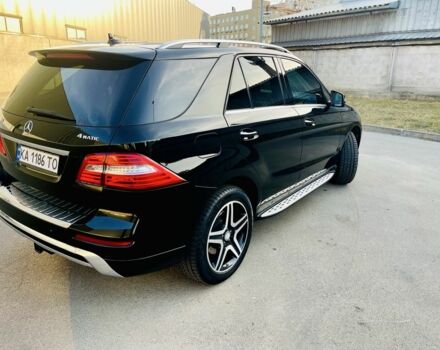 Чорний Мерседес МЛ 400, об'ємом двигуна 3 л та пробігом 157 тис. км за 25300 $, фото 10 на Automoto.ua