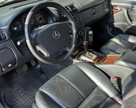 Черный Мерседес МЛ 500, объемом двигателя 5 л и пробегом 378 тыс. км за 7100 $, фото 11 на Automoto.ua