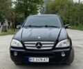 Черный Мерседес МЛ 55 АМГ, объемом двигателя 5.4 л и пробегом 124 тыс. км за 12000 $, фото 5 на Automoto.ua