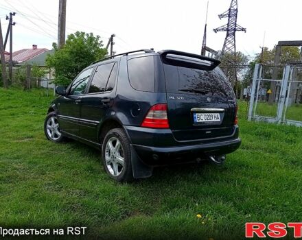 Чорний Мерседес ML-Class, об'ємом двигуна 3.2 л та пробігом 297 тис. км за 5999 $, фото 2 на Automoto.ua