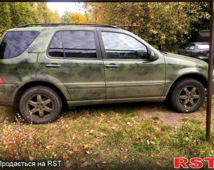 Чорний Мерседес ML-Class, об'ємом двигуна 4 л та пробігом 330 тис. км за 6000 $, фото 1 на Automoto.ua