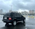 Черный Мерседес МЛ класс, объемом двигателя 4 л и пробегом 250 тыс. км за 4999 $, фото 4 на Automoto.ua