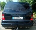 Черный Мерседес МЛ класс, объемом двигателя 2.7 л и пробегом 248 тыс. км за 8000 $, фото 1 на Automoto.ua
