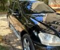 Чорний Мерседес МЛ класс, об'ємом двигуна 3 л та пробігом 300 тис. км за 12000 $, фото 1 на Automoto.ua