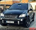 Чорний Мерседес МЛ класс, об'ємом двигуна 6.2 л та пробігом 249 тис. км за 14900 $, фото 1 на Automoto.ua