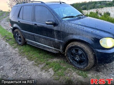 Мерседес ML-Class 2001 у Изюме на Automoto.ua Чорний Мерседес ML-Class, об'ємом двигуна 3.2 л та пробігом 333 тис. км за 6800 $, фото 1 на Automoto.ua