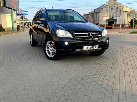 Чорний Мерседес МЛ класс, об'ємом двигуна 3.5 л та пробігом 230 тис. км за 11950 $, фото 1 на Automoto.ua