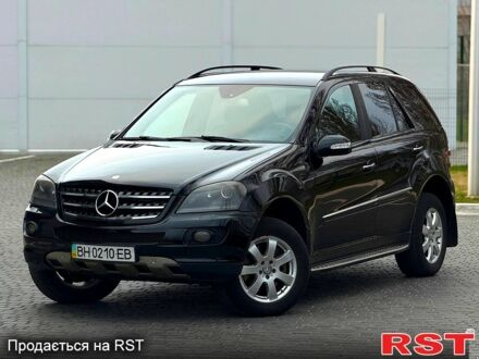Чорний Мерседес МЛ класс, об'ємом двигуна 3 л та пробігом 290 тис. км за 8700 $, фото 1 на Automoto.ua