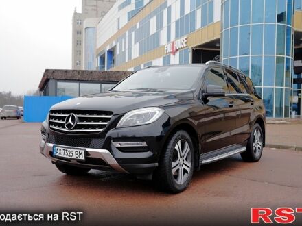 Чорний Мерседес МЛ класс, об'ємом двигуна 3 л та пробігом 255 тис. км за 25000 $, фото 1 на Automoto.ua