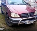 Червоний Мерседес ML-Class, об'ємом двигуна 3.2 л та пробігом 300 тис. км за 6000 $, фото 1 на Automoto.ua