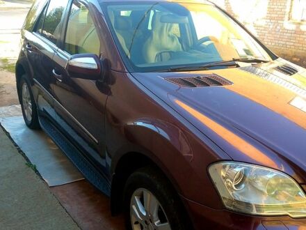 Червоний Мерседес МЛ класс, об'ємом двигуна 3.5 л та пробігом 347 тис. км за 13300 $, фото 1 на Automoto.ua