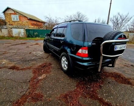 Мерседес ML-Class, об'ємом двигуна 3.2 л та пробігом 200 тис. км за 5750 $, фото 12 на Automoto.ua