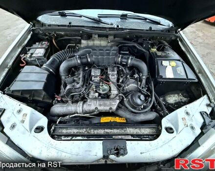 Серый Мерседес МЛ класс, объемом двигателя 4 л и пробегом 277 тыс. км за 3500 $, фото 8 на Automoto.ua