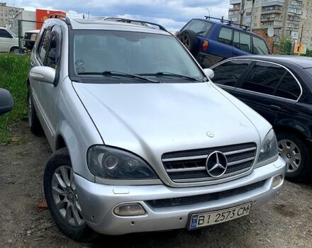 Сірий Мерседес ML-Class, об'ємом двигуна 3 л та пробігом 250 тис. км за 4800 $, фото 2 на Automoto.ua