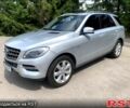 Серый Мерседес МЛ класс, объемом двигателя 3 л и пробегом 270 тыс. км за 21500 $, фото 1 на Automoto.ua
