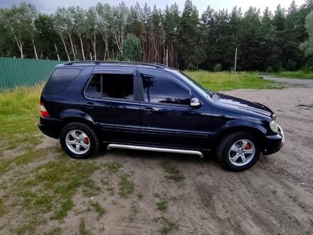 Синій Мерседес ML-Class, об'ємом двигуна 3.2 л та пробігом 318 тис. км за 8000 $, фото 1 на Automoto.ua