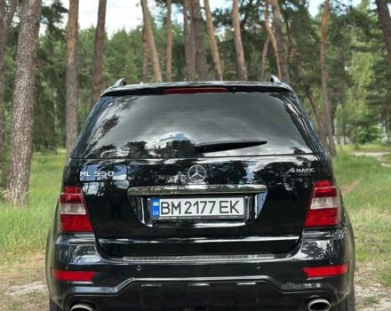 Чорний Мерседес МЛ, об'ємом двигуна 5.5 л та пробігом 255 тис. км за 12000 $, фото 1 на Automoto.ua