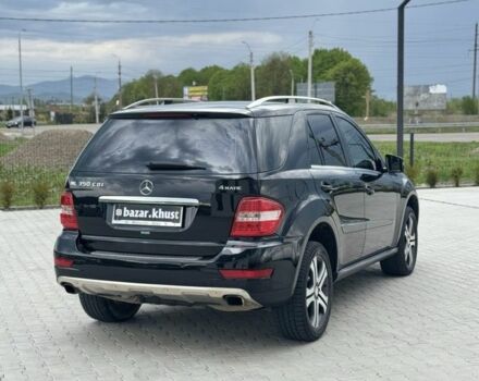 Черный Мерседес МЛ, объемом двигателя 3 л и пробегом 260 тыс. км за 14800 $, фото 1 на Automoto.ua