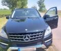 Черный Мерседес МЛ, объемом двигателя 3 л и пробегом 256 тыс. км за 19900 $, фото 1 на Automoto.ua