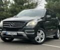 Черный Мерседес ML серия, объемом двигателя 3 л и пробегом 219 тыс. км за 21999 $, фото 1 на Automoto.ua