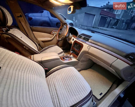 Черный Мерседес С Класс, объемом двигателя 5 л и пробегом 299 тыс. км за 4200 $, фото 1 на Automoto.ua