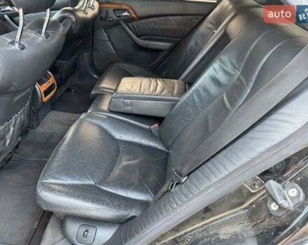 Черный Мерседес С Класс, объемом двигателя 5 л и пробегом 400 тыс. км за 3500 $, фото 1 на Automoto.ua