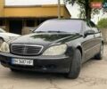 Черный Мерседес С Класс, объемом двигателя 5.8 л и пробегом 310 тыс. км за 4600 $, фото 1 на Automoto.ua