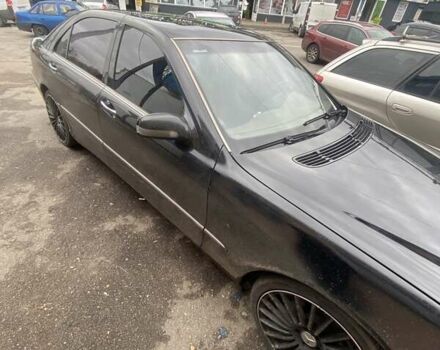 Черный Мерседес С Класс, объемом двигателя 4.97 л и пробегом 350 тыс. км за 3500 $, фото 4 на Automoto.ua