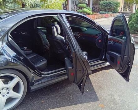 Чорний Мерседес С Клас, об'ємом двигуна 5.5 л та пробігом 235 тис. км за 10999 $, фото 28 на Automoto.ua