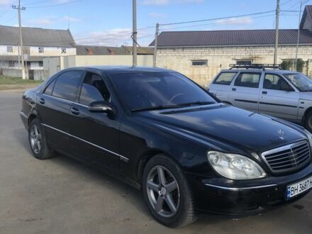 Черный Мерседес С Класс, объемом двигателя 5.8 л и пробегом 311 тыс. км за 3900 $, фото 1 на Automoto.ua