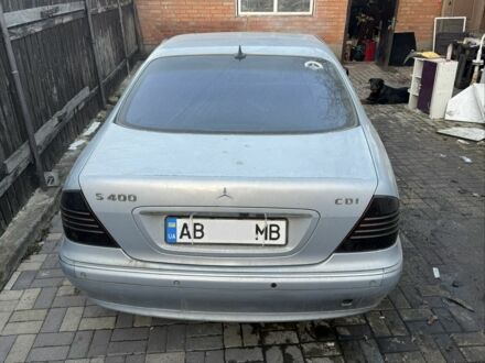Сірий Мерседес С Клас, об'ємом двигуна 4 л та пробігом 217 тис. км за 9481 $, фото 1 на Automoto.ua