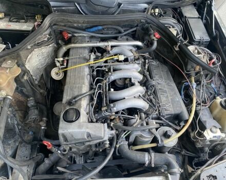 Черный Мерседес В124, объемом двигателя 3 л и пробегом 450 тыс. км за 1800 $, фото 1 на Automoto.ua